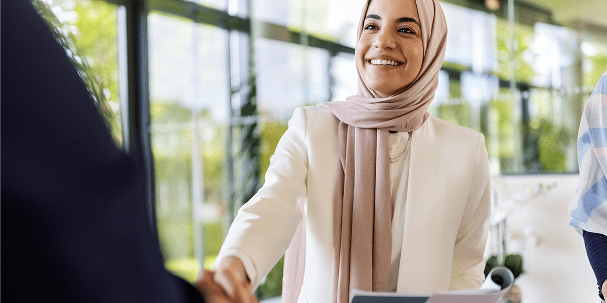 woman shaking hands